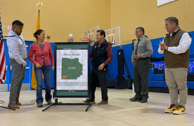 Secretary of the Interior Deb Haaland, second from the left, helped Pueblo of Jemez Gov. Peter Madalena, center