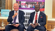 Kabwe community leader Barry Mulimba discusses lead poisoning with Peter Hain at the UK House of Lords, 29 October 2024. (Photo David Whitehouse/The Africa Report)